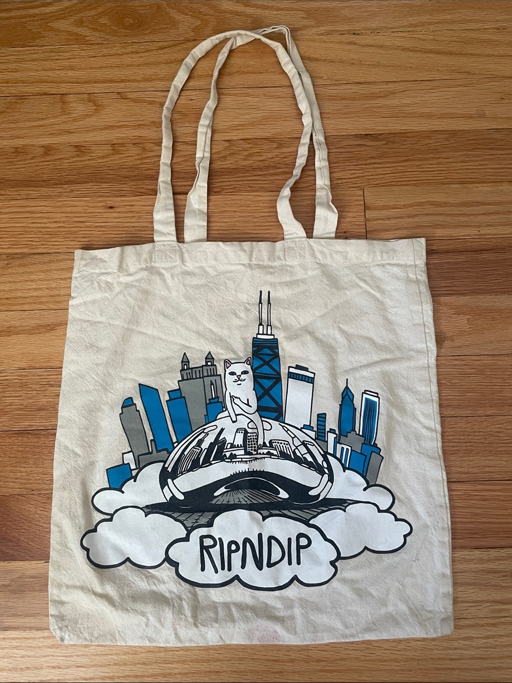 Ripndip White Canvas Tote with Blue & Gray Cityscape Graphic